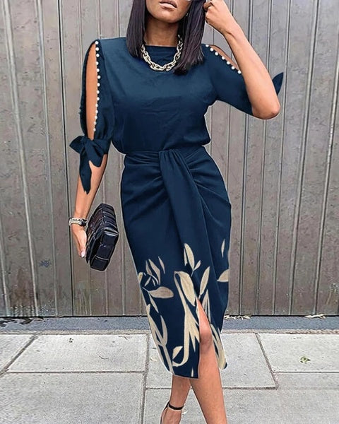 Selena | Gebundenes Arbeitskleid mit Perlendekor und botanischem Print