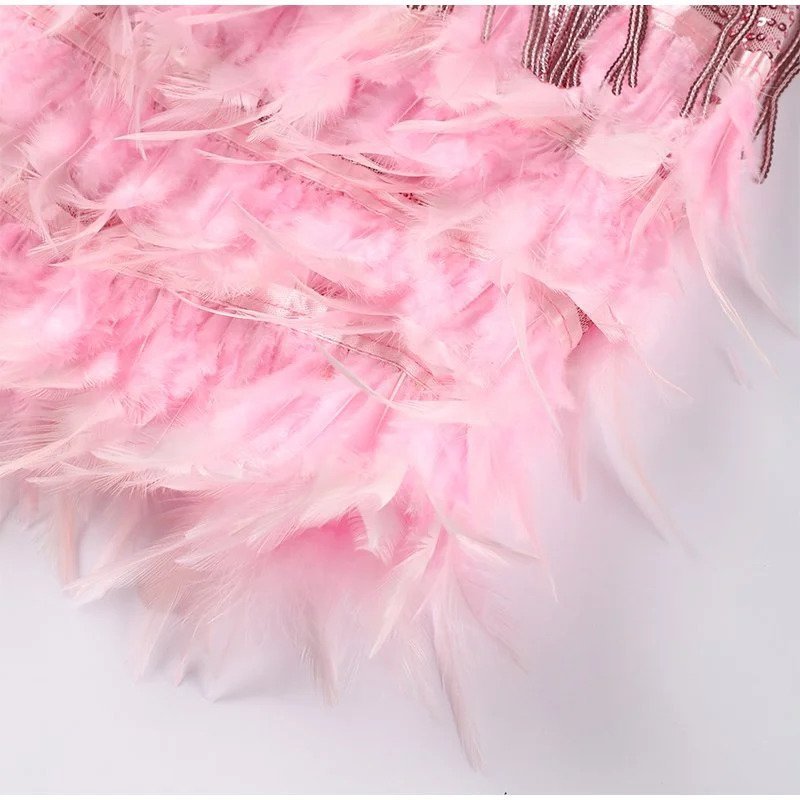 Sorvaya | Glamouröses Federkleid