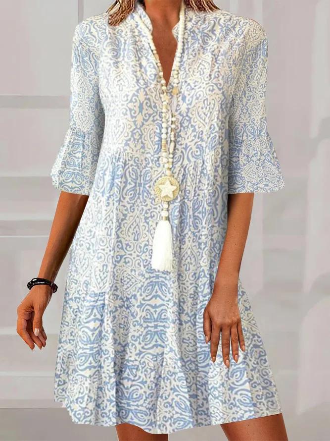 Silvia | Vintage-Minikleid mit blau-weißem Muster und halblangen Ärmeln