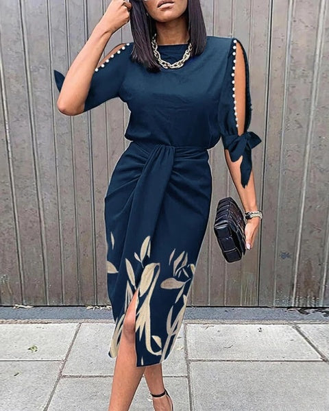 Selena | Gebundenes Arbeitskleid mit Perlendekor und botanischem Print
