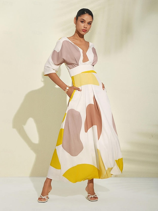 Elegantes langes Sommerkleid mit ausgeschnittenem Ausschnitt und dreiviertel Ärmeln